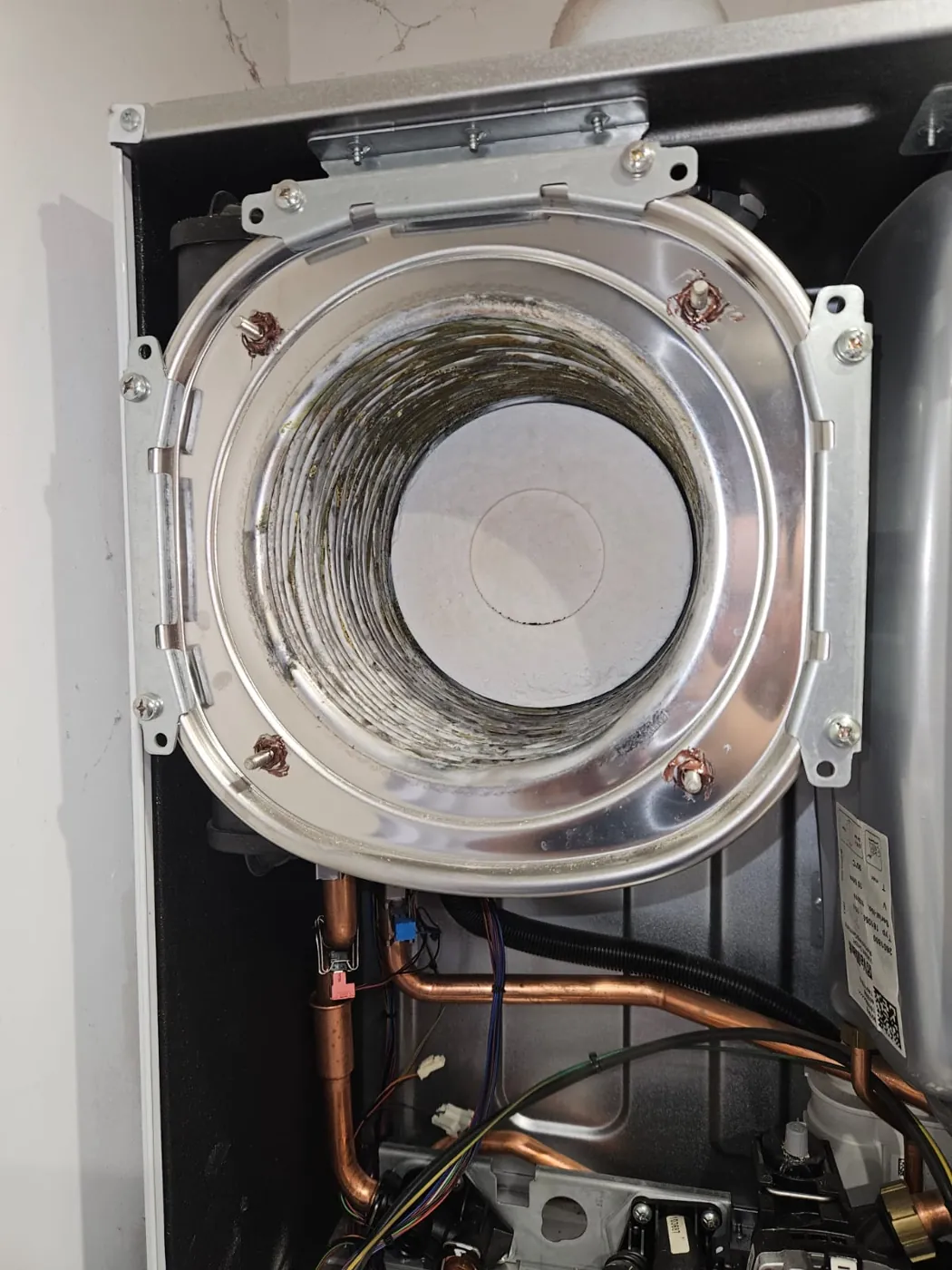 Boiler burner and heat exchanger opened up during an electrode replacement