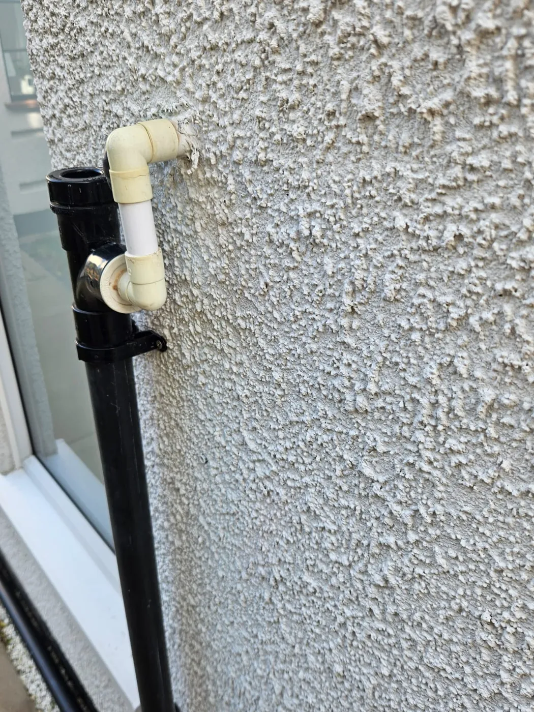 Condensate pipe frozen where it turns a corner on an outside wall