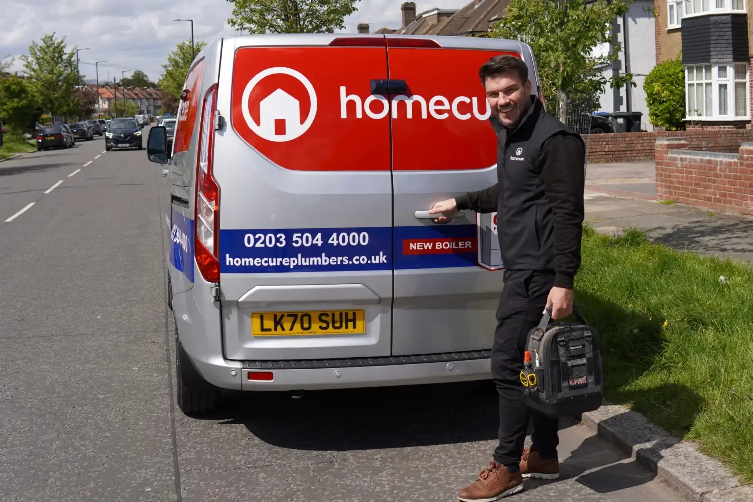 Worcester boiler engineer next to van